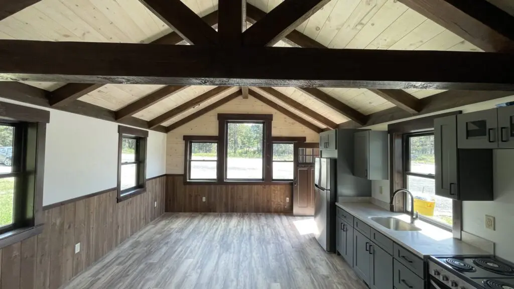 Cabin interior with kitchen and living area