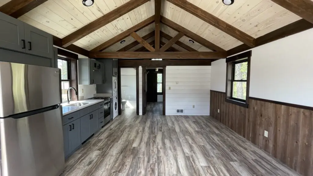 Cabin kitchen with vaulted timber ceiling