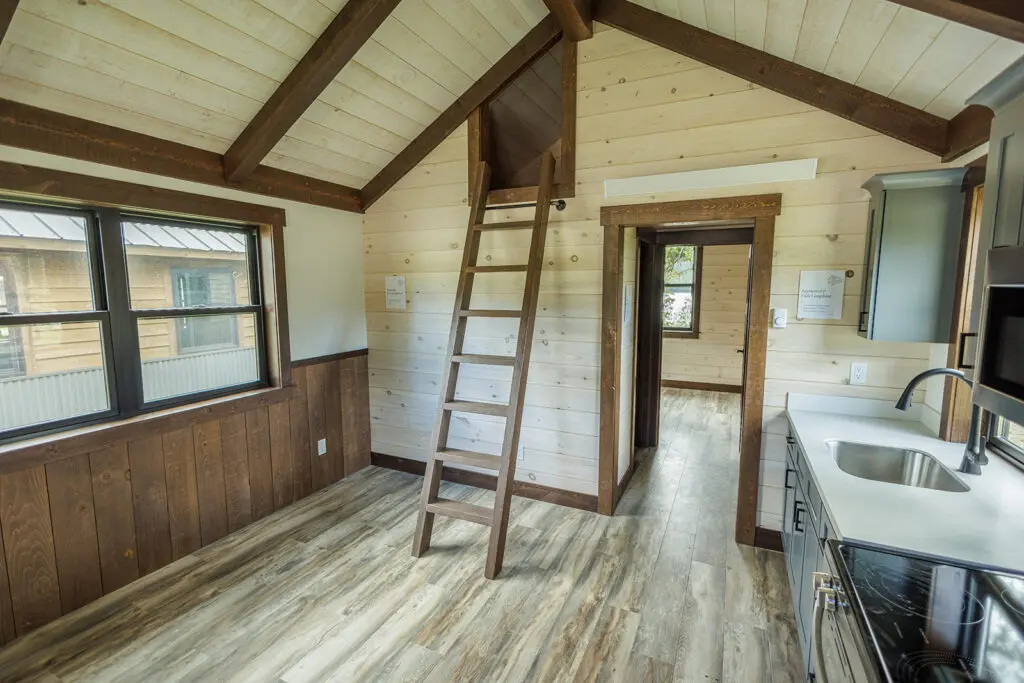 Tamarack cabin interior with timber framing